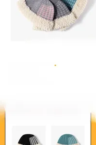 Detailed view of winter knitted bucket hat with thick fleece lining and houndstooth pattern