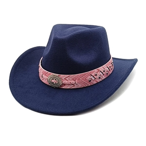 Close-up of navy wool fedora with bohemian pink patterned band and sunburst buckle
