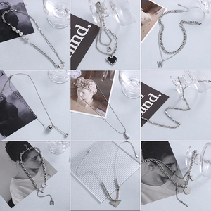 Minimalist silver stainless steel necklaces set with various geometric pendants
