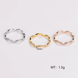 Three-color minimalist wavy stackable rings set with zircon in gold, silver and rose gold