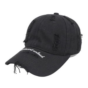Close-up of black cotton baseball cap with distressed details and white embroidery