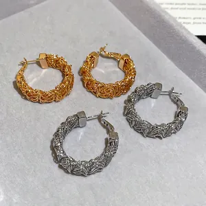 Textured woven gold and silver hoop earrings in a vintage braided design for women