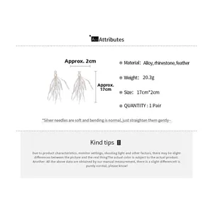 Detailed view of silver needle teardrop feather tassel earrings with rhinestone alloy finish