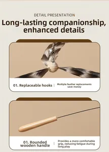 Detail view of cat teaser wand featuring natural feathers, bell and solid wooden handle
