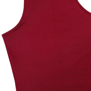 Close-up of wine red sleeveless dress showing fine fabric texture and quality stitching
