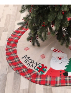 Linen Christmas tree skirt with red plaid trim featuring Santa Claus and snowflake embroidery