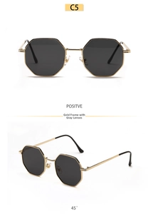 Front and 45-degree views of octagonal gold metal frame sunglasses with dark grey lenses