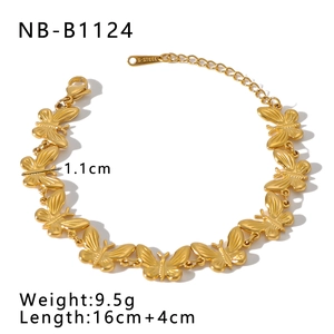 Macro shot of 18K gold plated butterfly link bracelet with lobster clasp and chain