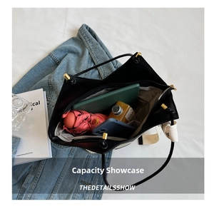 Detailed top view of large heart tote bag interior showing capacity for tablet and items