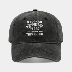 Washed cotton baseball cap in charcoal with white 90th birthday slogan embroidery