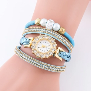 Detailed view of sky blue multi-layer leather wrap watch with rhinestones and beads