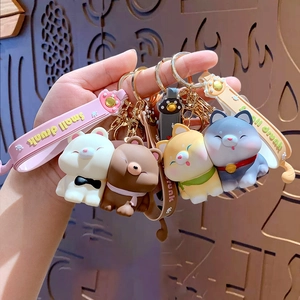 Niedliches Shiba Inu Hundeanhänger-Set mit bunten Handschlaufen und goldenen Schlüsselringen