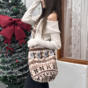 Detailed plush crossbody bucket bag with Nordic snowflake pattern and soft fuzzy texture