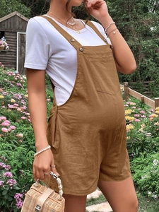 Brown maternity cotton linen overalls with adjustable straps and side pocket in garden