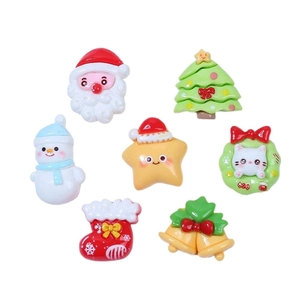Set of 7 colorful Christmas resin charms including Santa Claus, snowmen and kittens