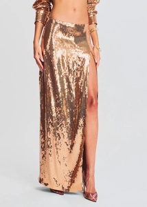 Detailed close-up of rose gold sequin skirt featuring a high side slit and premium fabric