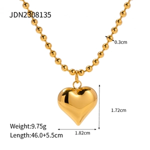 Classic 18k gold heart pendant necklace with beaded ball chain on white background