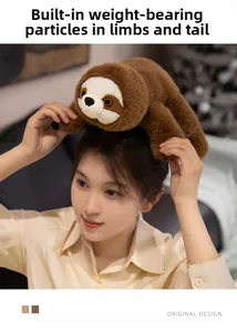 Plush sloth toy with internal weighted pellets for stability shown on a person's head