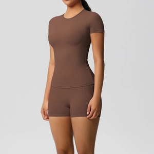 Chocolate brown two-piece yoga set with short sleeve t-shirt and high waist fitted shorts