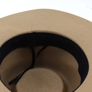 Detail view of the camel wool fedora interior featuring adjustable drawstring sweatband