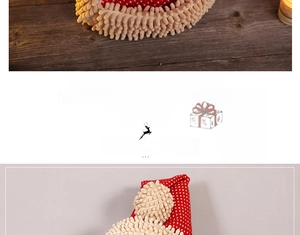 Detail of red polka dot knitted fabric and plush textures for Christmas decorations
