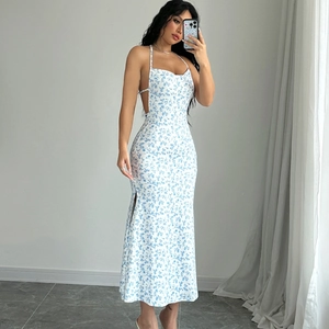 Floral halter neck dress with backless design and high side slit in a slim fit