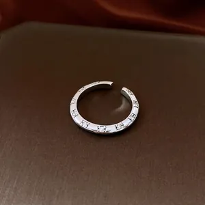 Silver flower open ring with sparkling white cubic zirconia in a modern 45-degree view