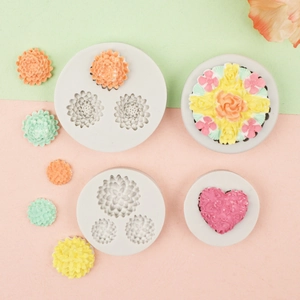 Detail view of silicone mold showing chrysanthemum and heart shapes for baking and clay