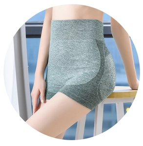 Close-up of high-waisted fitness shorts featuring honeycomb breathable mesh and seamless knit