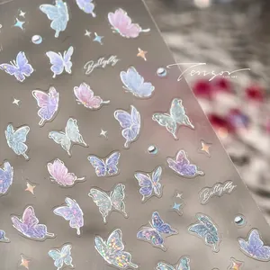 Macro detail of holographic butterfly nail art stickers with laser glitter finish