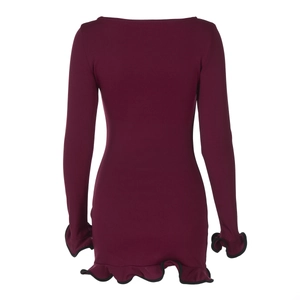 Back view of bodycon dress with ruffled edges and black piping on wine red fabric