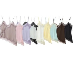 Flat lay display showing lace-trimmed satin camisole tops in multiple vibrant colors