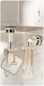 Rotating six-claw wall hook for kitchen tools with folding design on marble wall