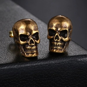 Hip hop style skull stud earrings in retro bronze finish with gothic punk metal texture
