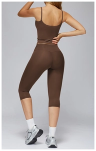 Rear view of brown brushed yoga set featuring slim tank top and high-waist flared leggings
