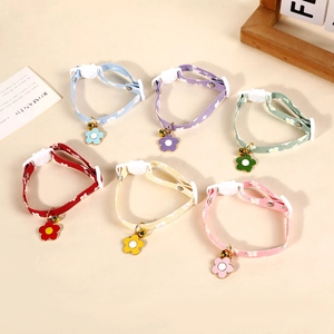 Floral pet collar set with sun flower charms and bells in multiple vibrant colors