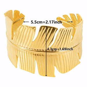 Detail view of 18k gold plated stainless steel cuff bracelet with leaf vein texture