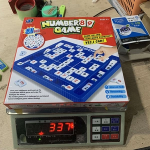 Detailed view of Sudoku board game weighing 337 grams for logistics weight verification