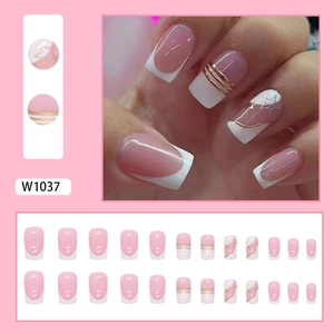 White French press-on nails with gold lines and star patterns, 24-piece manicure set