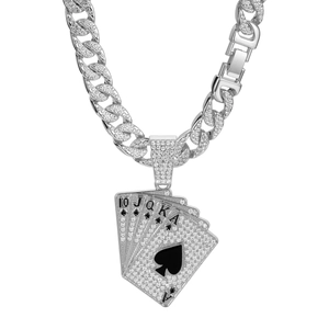 Close-up of hip-hop iced out poker royal flush pendant on a silver Cuban link chain