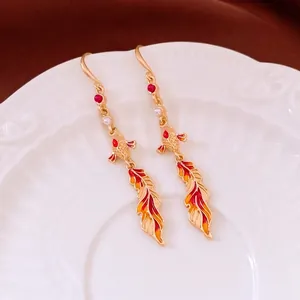 Vintage koi fish tassel earrings with red enamel and pearls in luxury gold finish
