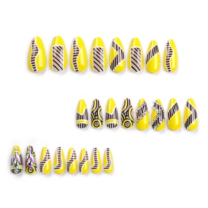 Abstract long almond press-on nails with yellow stripes and sparkling rainbow rhinestones