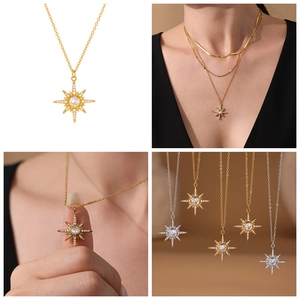 Vue détaillée des pendentifs étoiles à huit branches en or et argent avec zircons 5A