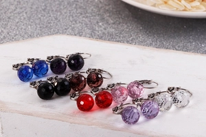 Multiple pairs of 10mm faceted crystal drop earrings in vibrant colors and gold hooks