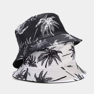 Cappelli alla pescatora con stampa di palme per protezione solare da spiaggia