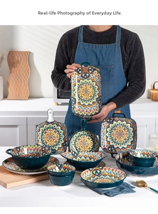 Detail of bohemian ceramic tableware set with intricate mandala pattern in deep green