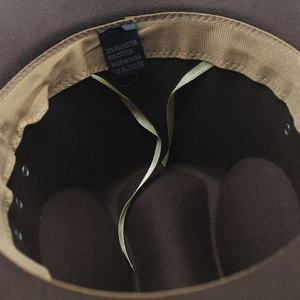 Detail of wool western hat interior with cotton blend label and adjustable straps