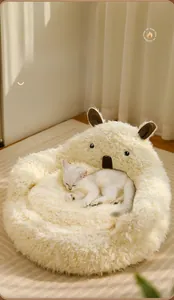 Close-up of soft alpaca-themed plush pet bed with detailed embroidery for cats and dogs