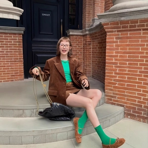 Caramel corduroy skirt with green sweater and blazer set for retro autumn style outfits