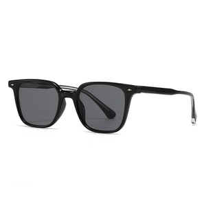 Retro oversized square sunglasses with black frames, dark grey lenses and metal temple detail